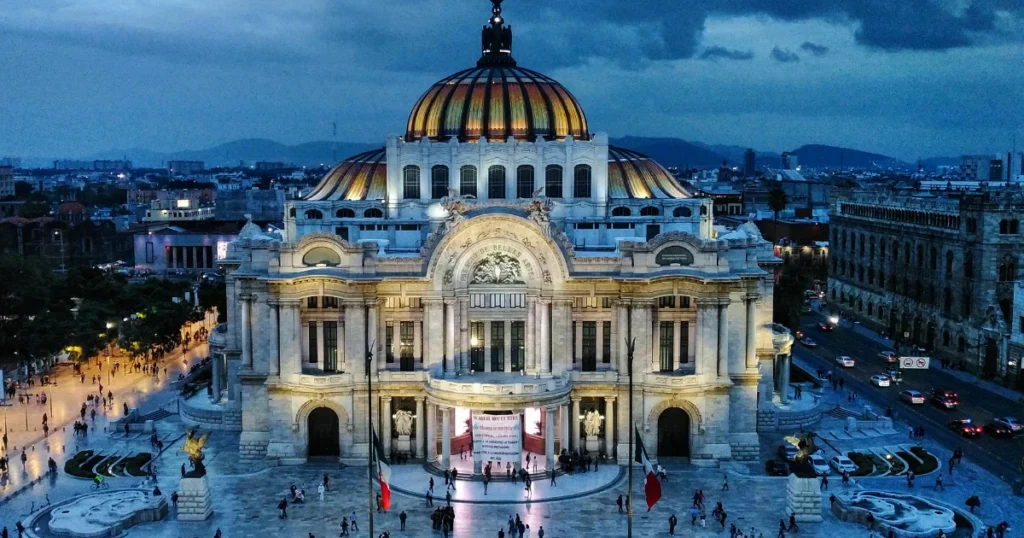 People walking near a historic building