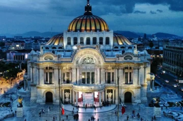 People walking near a historic building
