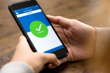 Phone screen showing a confirmed payment with green checkmark