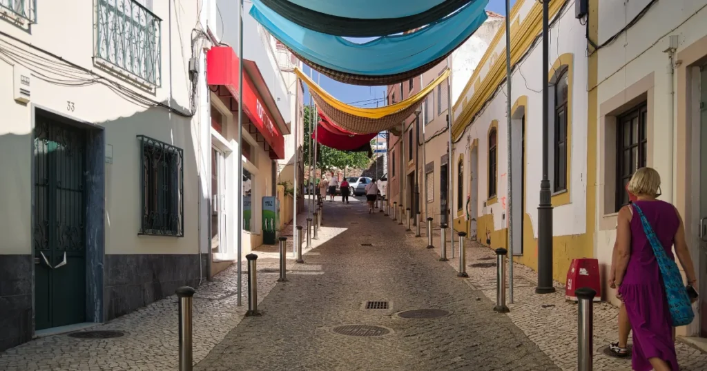 Colourful street with awnings in the Algarve, Portugal