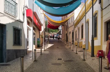 Colourful street with awnings in the Algarve, Portugal