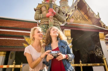Tourists visiting the Grand Palace temple in Thailand